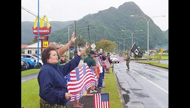 Amata and Veterans wave the U.S. Flag on Veterans Day 2020