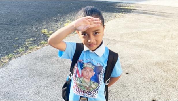 A Manumalo student saluting our Veterans 