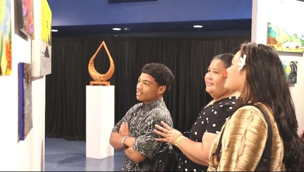viewing the art at annual Moso'oi Gala