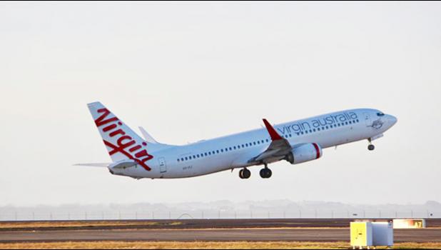  A Virgin Australia Boeing 737 takes off at Auckland Airport. [Photo / Grant Bradley via NZ Herald] 