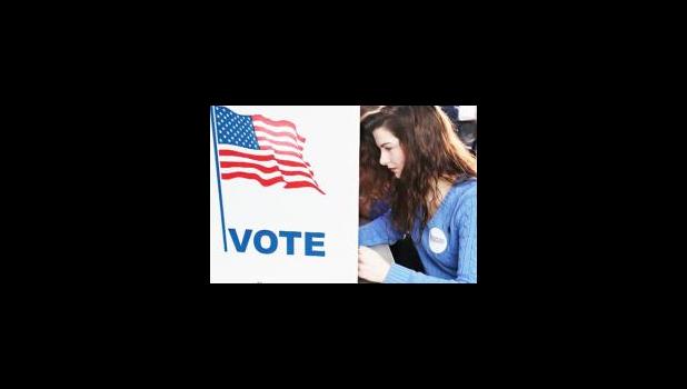 Abi Nesbitt, a UW-Eau Claire freshman from Mosinee, Wis., votes in her first primary election at UW-Eau Claire's Davies Center on Tuesday morning, April 5, 2016. (Photo: Dan Reiland/The Eau Claire Leader-Telegram via AP)