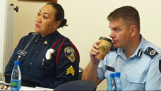 DPS Detective Vaivasa Wells (left), pictured with Matthew Varley
