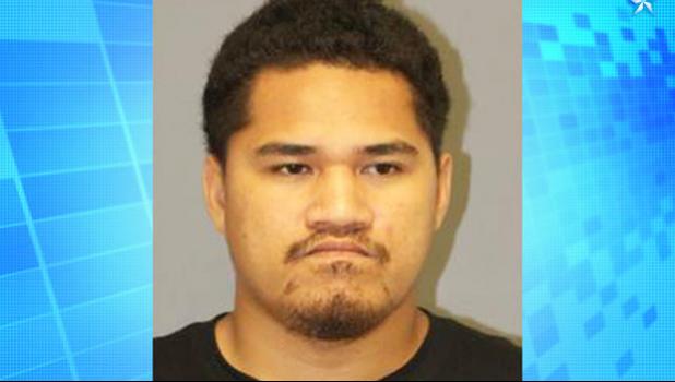 Si Ufaga Moana was charged Wednesday with abuse of a family member in the presence of a child. [photo: HPD]