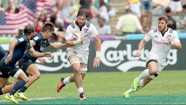 At the HSBC World Rugby Sevens Series XVIII in Hong Kong on April 8, 2017 USA's Danny Barrett makes a break with Stephen Tomasin in support.  USA beat Argentina 33-5 to win Pool D with 9 points.   USA will face England in the Cup quarter finals.  Argentina  will play Australia, winner of Pool A.