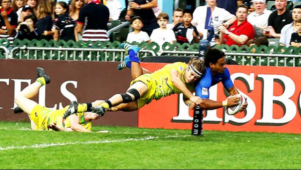 Gordon Langkilde scores in the corner in Hong Kong against Australia.  Australia, the top seed in pool A, narrowly beat Samoa 22-19.  Samoa now faces England and Korea on Saturday in their other two pool play matches at the 2017 Cathay Pacific/HSBC Hong Kong Sevens.  
