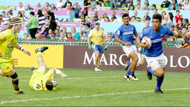 Lafaele Tuliuvaa scores Samoa's second try in Hong Kong against Australia.  Australia, the top seed in pool A, narrowly beat Samoa 22-19.  Samoa now faces England and Korea on Saturday in their other two pool play matches at the 2017 Cathay Pacific/HSBC Hong Kong Sevens.  
