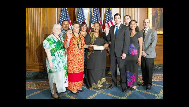 Catholic Church leader, Bishop Peter Brown (middle) and eight religious leaders in American Samoa from various denominations carried out the Conferment Blessing for Gov. Lolo Matalasi Moliga (kneeling left) and Lt. Gov. Lemanu Palepoi Sialega Mauga at yesterday’s Inauguration ceremony for the Lolo and Lemanu Administration.  [photo: AF]