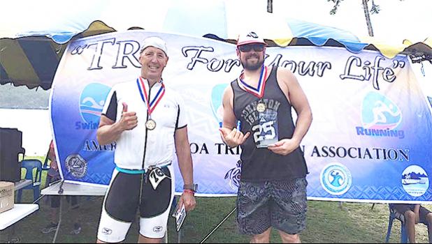 Winners of Saturday's Triathlon Olympic Division: Scott Alpuerto (first place) and Matt Bracken (2nd place). The Olympic challenge featured a mile swim, twenty-four-mile bike route, and a six-mile run. See story for full details.  [photo Mark Espiritu]