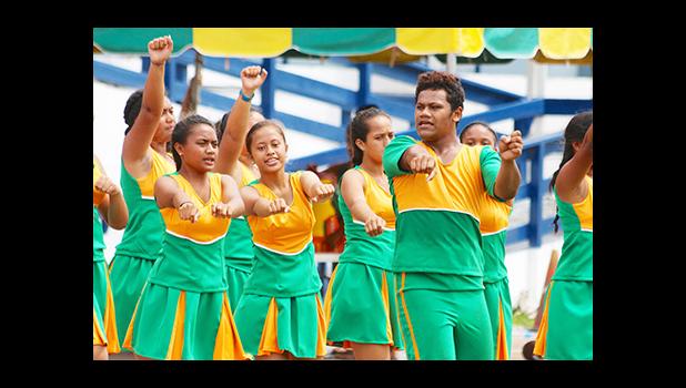 Leone High School is the only school with a cheerleading squad this year. They are seen here supporting their Lions Varsity team in the tough match against the Vikings last Saturday. [photo: TG]