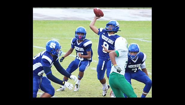 Anthony Feala of the Sharks has proven to be one of the most threatening quarterbacks in the Junior Varsity Division, after a remarkable performance in their 38-point victory against the Lions last Saturday morning. [photo: TG]