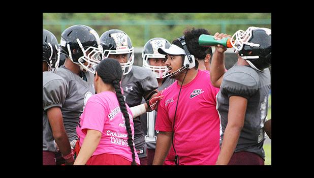 Former Warriors All-Star Linebacker, Travis Pavihi – back at the Home of the Warriors as Defensive Coordinator, calling the shots on defense when they shut out the Lions 38 - 0 last Friday evening, in the opening game of ASHSAA Football Week No. 9. [photo: TG]