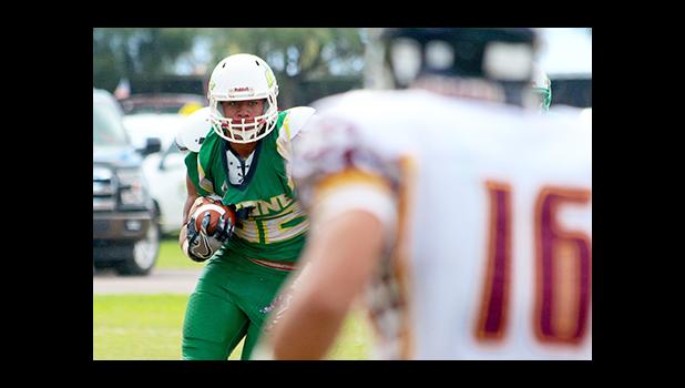 Api Sooalo of Leone returning a kick off return in the third quarter of their varsity game against Tafuna, last Saturday as the opening game of Week No.9s triple header at the Veterans Memorial Stadium.  [photo: TG]