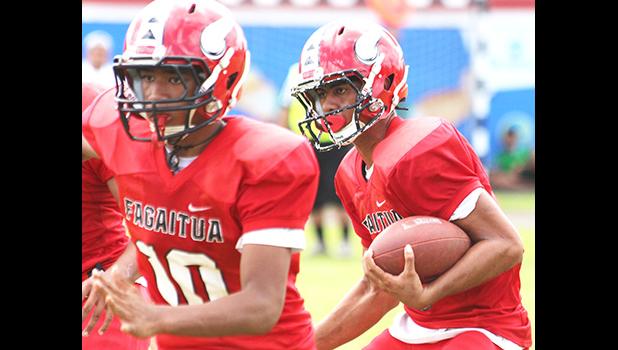 Faga’itua Vikings quarterback Fitu Amata behind his blockers