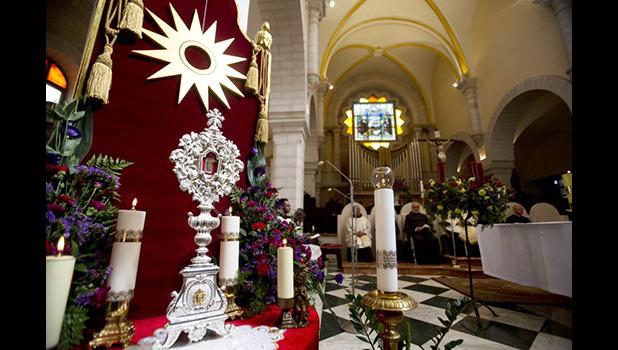 A wooden relic believed to be from Jesus' manger is seen in an ornate case in the Church of the Nativity, traditionally believed by Christians to be the birthplace of Jesus Christ in the West Bank city of Bethlehem, Saturday, Nov. 30, 2019. A tiny wooden relic believed to have been part of Jesus' manger has returned to its permanent home in the biblical city of Bethlehem 1,400 years after it was sent to Rome as a gift to the pope. (AP Photo/Majdi Mohammed) A wooden relic in an ornate case believed to be from Jesus' manger