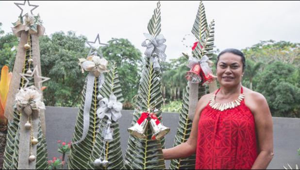 SAMOA'S OWN: Louise Main combines her love for nature and her keenness to create beautiful arts and crafts to produce striking decorative pieces and recently her take on the Christmas tree where she used palm fronds has been a hit. (Photo: Misiona Simo)