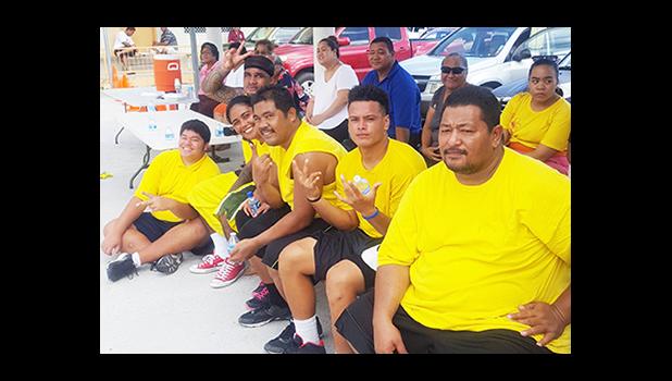 Members of the yellow team for the open division of the Manumalo Church Basketball Fellowship League kicked off last month and concluded on Saturday. [Courtesy photo]