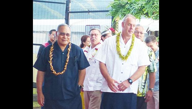 Assistant Interior Secretary for the Insular Areas Douglas Domenech in the background between Gov. Lolo Matalasi Moliga and former Interior Secretary Ryan Zinke 