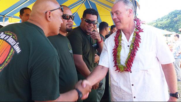 Sec. Zinke shaking hands with American Samoa firefighters