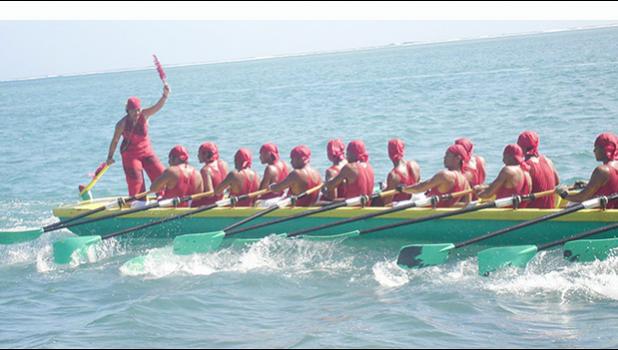 Zita Martel captaining her longboat inside the reef in Samoa.