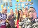 Haylie-Jeanette Tuiaoopo, center with office staff