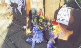 - In this Friday Dec. 9, 2016 file photo, flowers and notes left by well-wishers are displayed outside Comet Ping Pong, the pizza restaurant in Washington. There's at least a slice of good news for a pizza restaurant in the nation's capital that has been the target of fake news stories linking it to a child sex trafficking ring. In almost a week since an armed man arrived at Comet Ping Pong to investigate the conspiracy, neighbors and patrons have responded by bringing homemade signs, flowers and their pizza-purchasing power to the store. (AP Photo/Jessica Gresko) - In this Friday Dec. 9, 2016 file photo, flowers and notes left by well-wishers are displayed outside Comet Ping Pong, the pizza restaurant in Washington. There's at least a slice of good news for a pizza restaurant in the nation's capital that has been the target of fake news stories linking it to a child sex trafficking ring. In almost a week since an armed man arrived at Comet Ping Pong to investigate the conspiracy, neighbors and patrons have responded by bringing homemade signs, flowers and their pizz