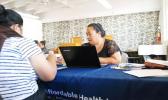 Cinder Sonis, right, an advocate with Legal Aid Society of Hawaii, helped a customer enroll in an Affordable Care Act health insurance plan on Monday, Jan. 30, 2017 in Honolulu. Faced with uncertainty about the federal health care law, Hawaii lawmakers are introducing bills to bring what they believe are the best parts of the Affordable Care Act into state law. (AP Photo/Cathy Bussewitz) Cinder Sonis, right, an advocate with Legal Aid Society of Hawaii, helped a customer enroll in an Affordable Care Act health insurance plan on Monday, Jan. 30, 2017 in Honolulu. Faced with uncertainty about the federal health care law, Hawaii lawmakers are introducing bills to bring what they believe are the best parts of the Affordable Care Act into state law. (AP Photo/Cathy Bussewitz)