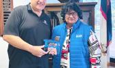 hief Volunteer Officer, Mrs. Mary A.T. Tulafono with presenter