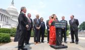 A 2023 photo including Congresswoman Amata, Congressman Moylan and other Members in the prior 118th Congress. AMATA WITH OTHERS