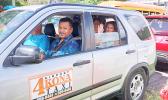 CRUISE SHIP VISITORS IN A TAXI