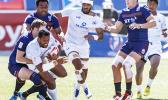 Neria Fomai #6 of Samoa tackled by Scotland defenders during the Trophy Semi Final match between Samoa and Scotland at the HSBC Rugby Sevens Series held in Sam Boyd Stadium March 3-5, 2017. Final score:  Scotland-0, Samoa- 24. (Photo by Allan Hamilton/ Calibre Sports Photomedia)