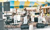The Big Wave, the Hawai’i based US Pacific Fleet Band performing to a crowd outside of the newly renovated museum.