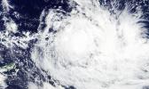  NASA's Terra satellite passed over Ella on May 9 at 2210 UTC and saw a somewhat elongated center of circulation located west of American Samoa. A band of thunderstorms east of the center were affecting the U.S. territory. Credit: NASA Goddard MODIS Rapid Response  [photo: via Phys.org]
