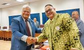 Save Liuato Afa Tuitele being congratulated