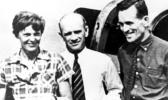 In this file photo taken on or about July 2, 1937, American aviator Amelia Earhart, left, and her navigator, Fred Noonan, right, pose beside their plane with gold miner F.C. Jacobs at Lae, New Guinea just before Earhart and Noonan took off in a flight to Howland Island on July 2, during which they disappeared somewhere in the Pacific. (AP Photo, File) In this file photo taken on or about July 2, 1937, American aviator Amelia Earhart, left, and her navigator, Fred Noonan, right, pose beside their plane with gold miner F.C. Jacobs at Lae, New Guinea just before Earhart and Noonan took off in a flight to Howland Island on July 2, during which they disappeared somewhere in the Pacific. (AP Photo, File)
