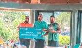 Matasaua fautasi from Manu'a receiving their first prize check