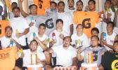 Some of the men of Pago Pago, who are trying out for this year’s AETO fautasi team, celebrating donations from Pago Pago Trading Company and H & H Samsung for their weekly training for one of the biggest event of the year in the territory — 2017 Flag Day Fautasi Race.  [photo: Ese Malala]