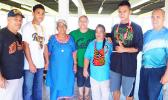 In this photo are the two young boxers at the airport with their families this past Monday as they prepared to leave for their training camp.  [Photo: EM]