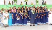 The American Samoa Women’s U-16 team at the Leone Holy Cross Parish with Father Kelemete Pua’auli (far right), Fofo County Senator Faaivae Iuli Alex Godinet (2nd from left), and Sua County Senator Muagututia Tauoa (middle) on Sunday, July 30, 2017.  [FFAS MEDIA/Brian Vitiolio]