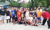 Aspiring basketball players participating in the ongoing ASBA summer clinic for the Central District, pictured with their coaches Diehl Langkilde and Milton Taufaasau. See story for full details.   [photo: Mark Espiritu]