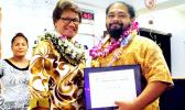 ASCC Vice President of Academic and Student Affairs Dr. Lina Galea'i-Scanlan (left) presents spring 2017 graduate Nafanua R. Tialu with the semester's Trades & Technology Award during the Graduate Banquet held last week. The event recognizes academic achievement and leadership in the diverse areas of study offered at ASCC.  [Photo: J. Kneubuhl]