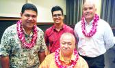 ASCC Political Science Club president George Young (standing, center) congratulates the presenters at the Political Status Forum held at the college last week. They are (l-r) House Rep. Samuel Meleisea, Dr. Dan Aga, Director of the ASG Office of Political Status (seated), and ASCC Executive Counsel Mr. Kenneth Kuaea.  [Photo: J. Kneubuhl]