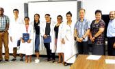Local high school students and attendees of the 9th Annual STEP-UP High School Summer Research Symposium held at the Agriculture, Community and Natural Resources (ACNR) Division of the American Samoa Community College (ASCC) on July 22, 2017.  (L to R) Dr. Rob Rivers, Athanasius Talataina, Olyvia Ta′ase, Joelyn G. Rafil, Karallyn Fitisone, Finiana Finau, Tausala Judy Leota, Dr. George Hui, Netini Sene and Dr. Joserose Jyothibhavan.  [Photo: ASCC-ACNR]
