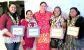 ASCC Agriculture, Community and Natural Resources (ACNR)/Land Grant Instruction Coordinator Mrs. Pauline Tuitele-McFall (center) celebrates alongside four recent ASCC graduates who will participate in various ACNR-organized internships this summer. Left-to-right: Fatima Aneki, June Talamoni, Tuitele-McFall, Jennet Chang and Logomalu Papalii.  [Photo: Katrina Garcia-Helsham]