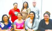 Monica Afalava (front, 2nd right), the new Program Coordinator for the American Samoa Area Health Education Center.  Front (l-r): Hawaii/Pacific Basin AHEC Associate Director Erica Davis; Hawaii/Pacific Basin AHEC Director Dr. Kelley Withy; Afalava; ASAHEC Board Co-Chair Dr. Robin Faumuina. Back (l-r): ASAHEC Board Chairwoman Ipu Eliapo-Unutoa; ASCC Dean of Academic Affairs Letupu Moananu; and ASCC-ACNR Community Nutritionist Travis Fleming. See story inside for details. [Photo: J. Kneubuhl]