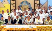 ASCC Samoan Studies Institue (SSI) Director Keseta Okenaisa Fauolo-Manila (center) is seen here with CCCAS Fagatogo Rev. Iasepi D. Ulu (to her immediate left), CCCAS Youth and SSI staff celebrating the launch of a new publication titles "O Lo'u Nuu o Fagatogo" or "Fagatogo, My Village," a collaboration between the CCCAS and the SSI.  [Courtesy Photo]