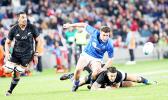 American Samoa's own Jerome Kaino, Sonny Bill Williams are unable to secure the ball due to ferocious Manu Samoa aggressive defense.  The New Zealand All Blacks defeated Manu Samoa 15s 78-0 at Eden Park, Auckland, New Zealand.   [Photo: Barry Markowitz]