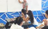 Ammon Fepuleai, from Pago Pago, a teacher at Samoana High School teaching his math class. During his spare time, he works with talented students and artists for Exposed Photography, which can be found on social sites such as You Tube and Facebook.  [photo: Ese Malala]