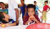 The Apple Eating Competition was one of the many games enjoyed by children — young & younger — who came to the 2nd Annual MASI Easter Bash at le Suigaula a le Atuvasa in Utulei, last Saturday. [Photo: EM] 