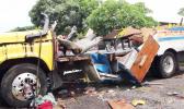 Footage of the incident's aftermath shows the bus crashed on the roadside without a roof and sides, and its seats badly damaged. [photo: Samoa Observer via MSN.com]
