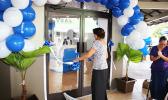 Human Resources Manager Jeannette Yamasaki – one of the longest working employees at Bluesky Communications cutting the ribbon to officially open their newly renovated store, on the ground floor of the Laufou Shopping Center yesterday morning, which also recognized Mrs. Yamasaki’s dedication and service to the company. [photo: TG]